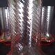 Art Deco orangeade service in pink-orange glass, twisted model.