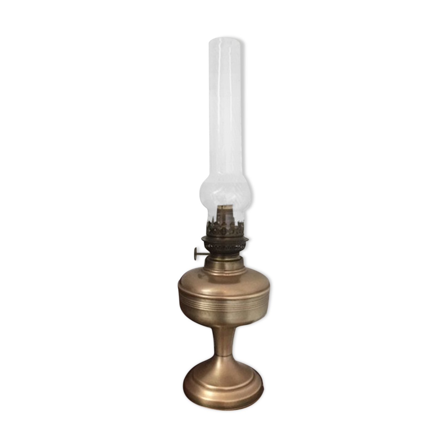 Old oil lamp on pink copper stand