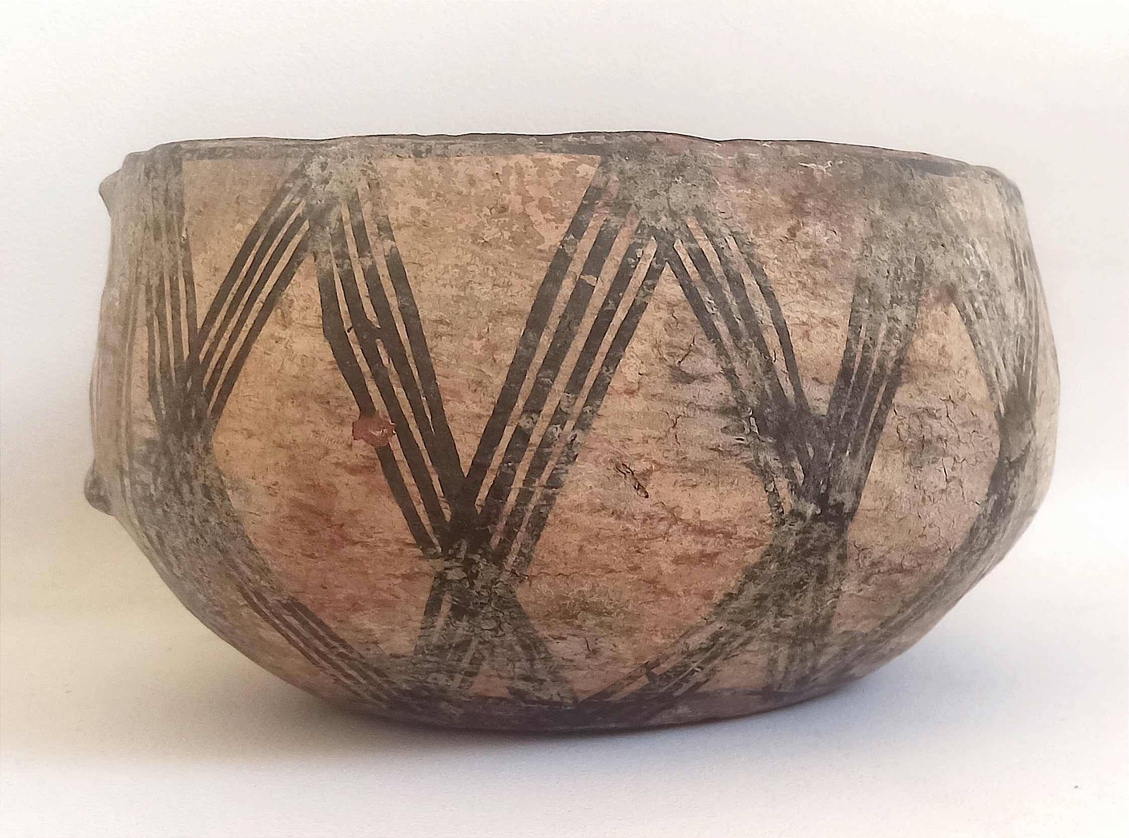 Large ethnic style bowl in orange terracotta, early 20th century