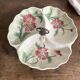 Art Nouveau slip dish with poppy decoration