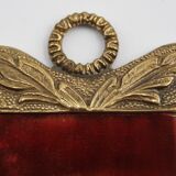 Vintage oval wall-mounted brass mirror