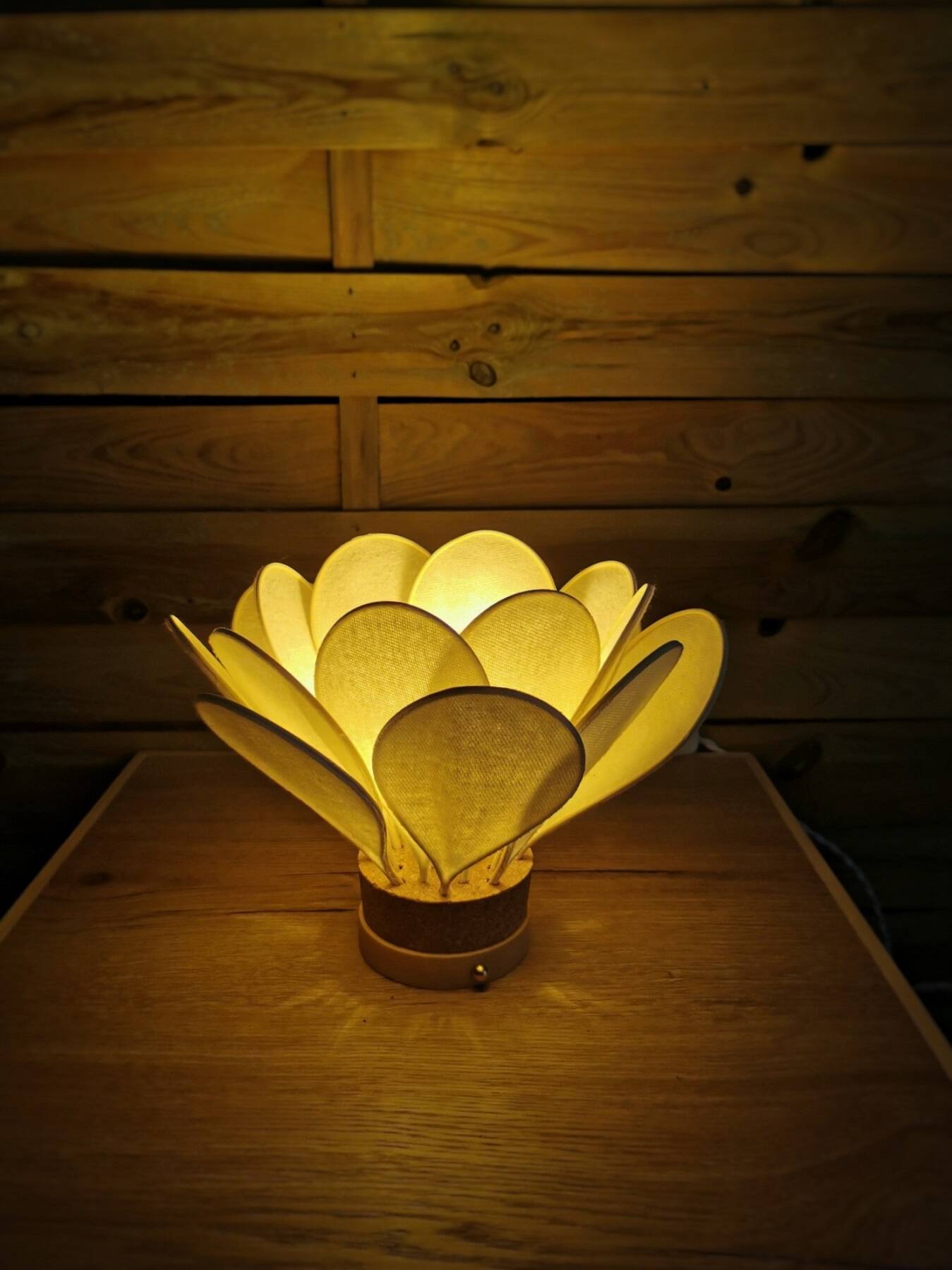 Flower table lamp made of rattan and ivory flannel petals