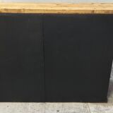 One-door workshop unit with eight black and gold drawers