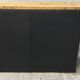 One-door workshop unit with eight black and gold drawers