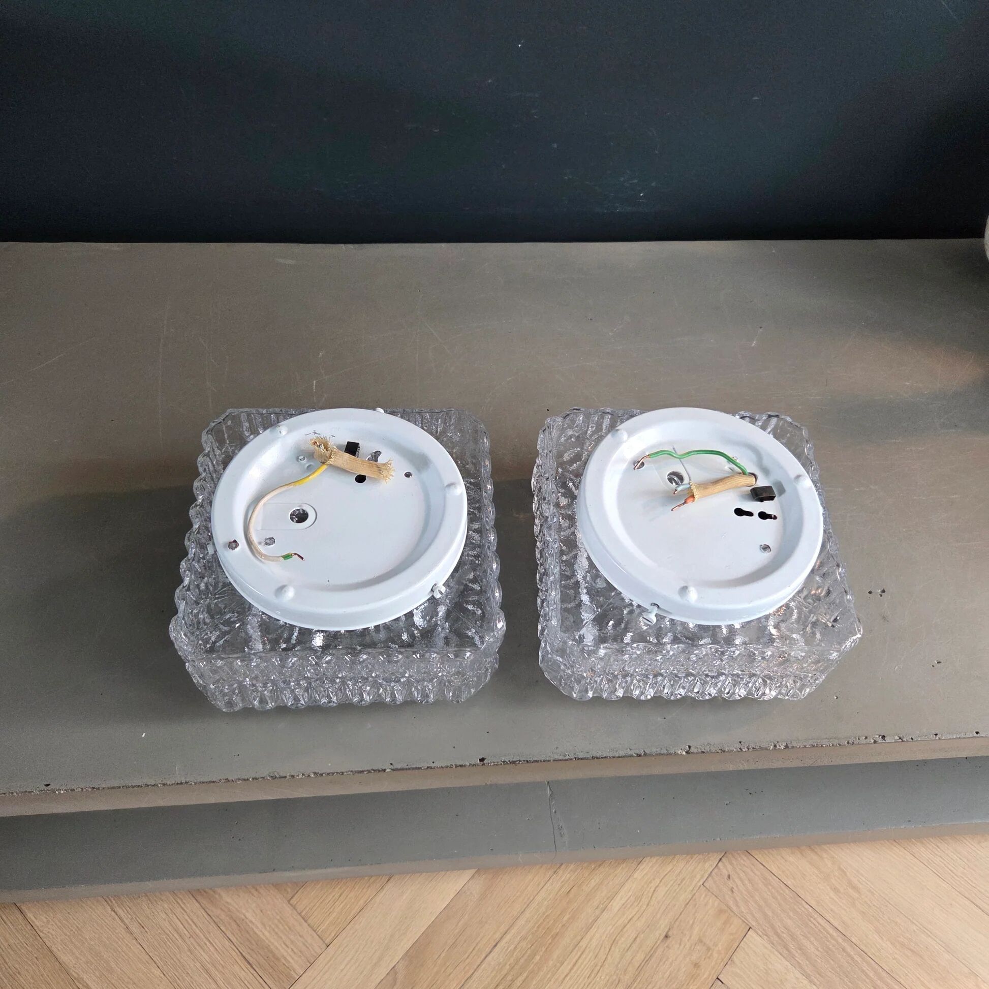 Pair of ceiling lights or moulded glass wall lights.