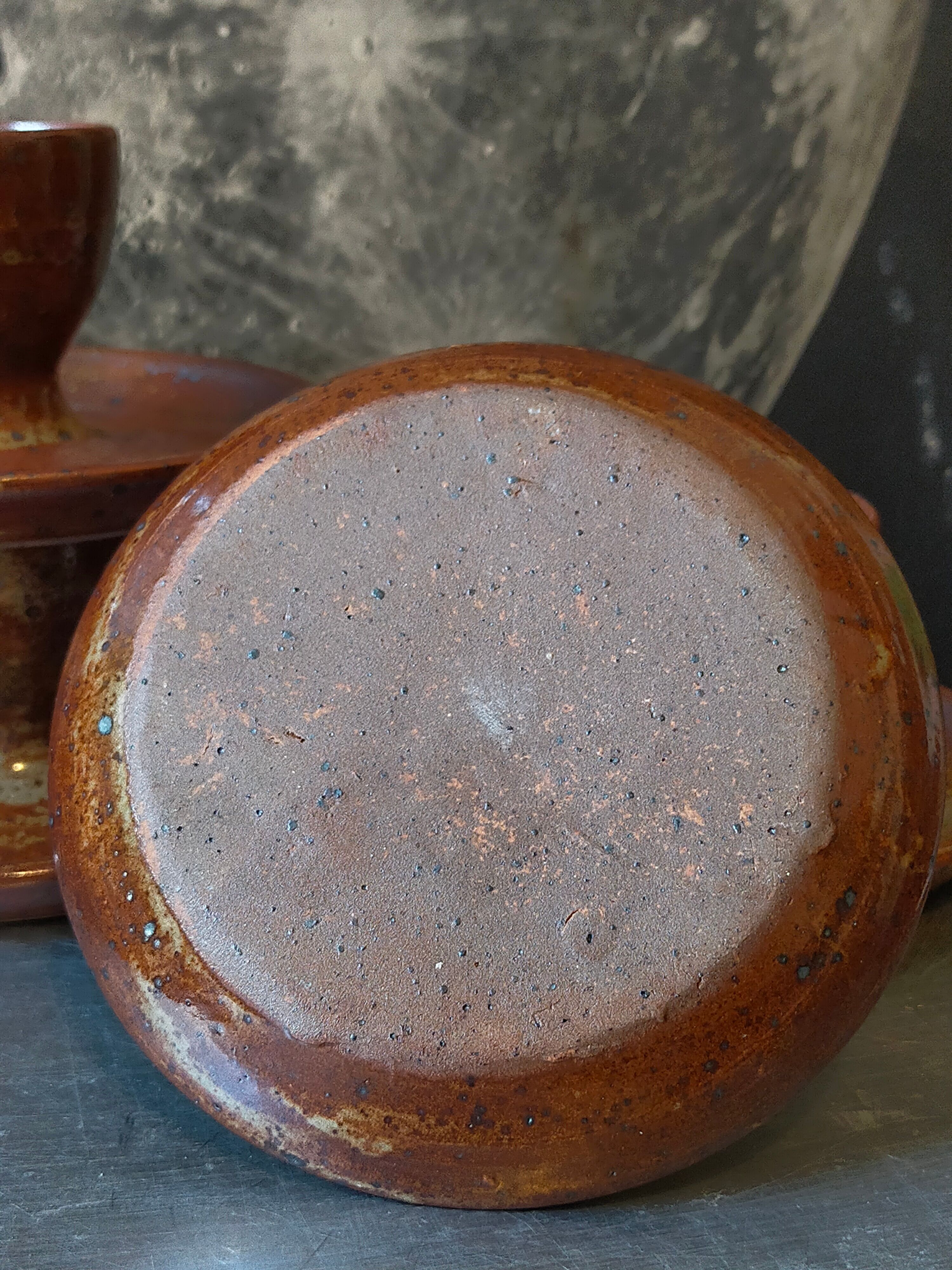 Four pyrite stoneware shells