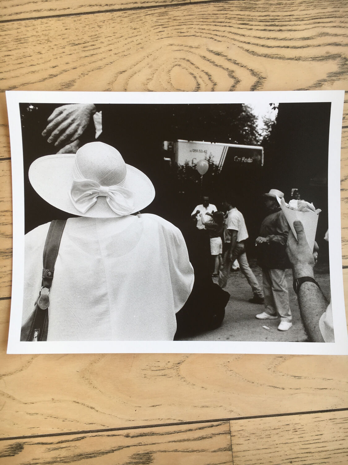 Photograph.woman with hat at funfair, 90s
