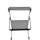 Black metal magazine rack