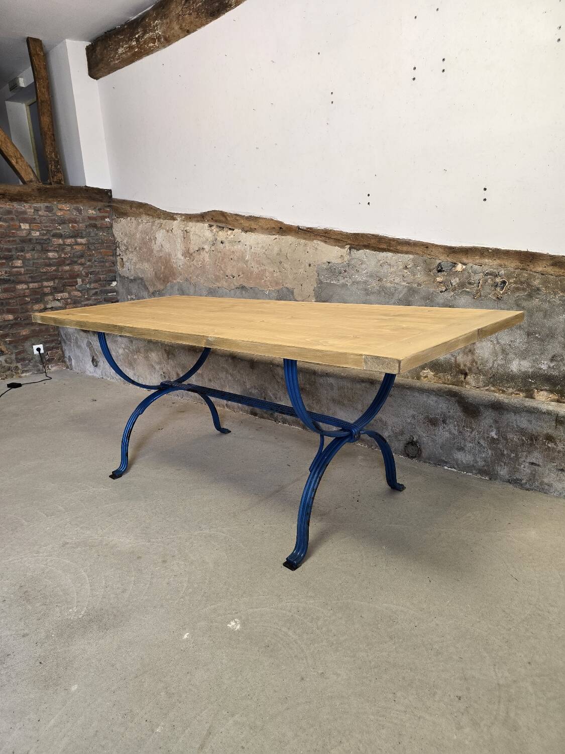 Wrought iron and solid wood table
