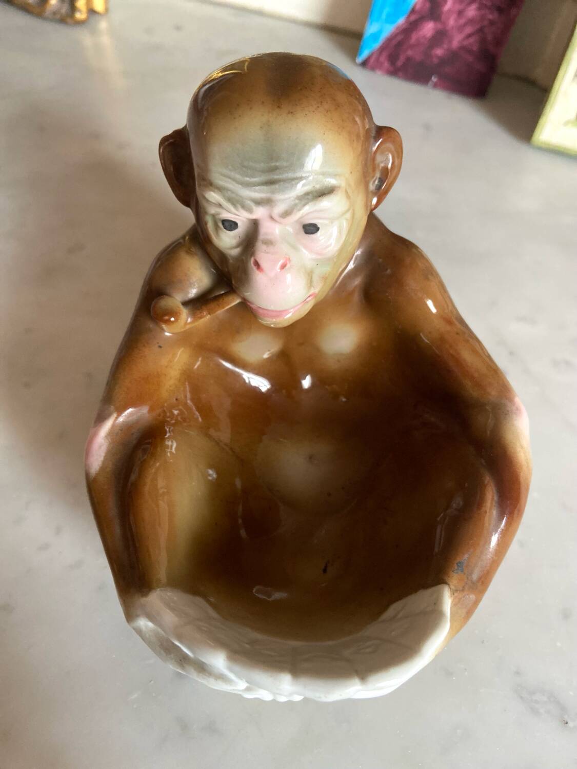 Pipe holder, ashtray or monkey pocket emptier