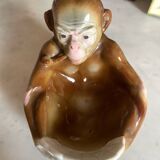 Pipe holder, ashtray or monkey pocket emptier