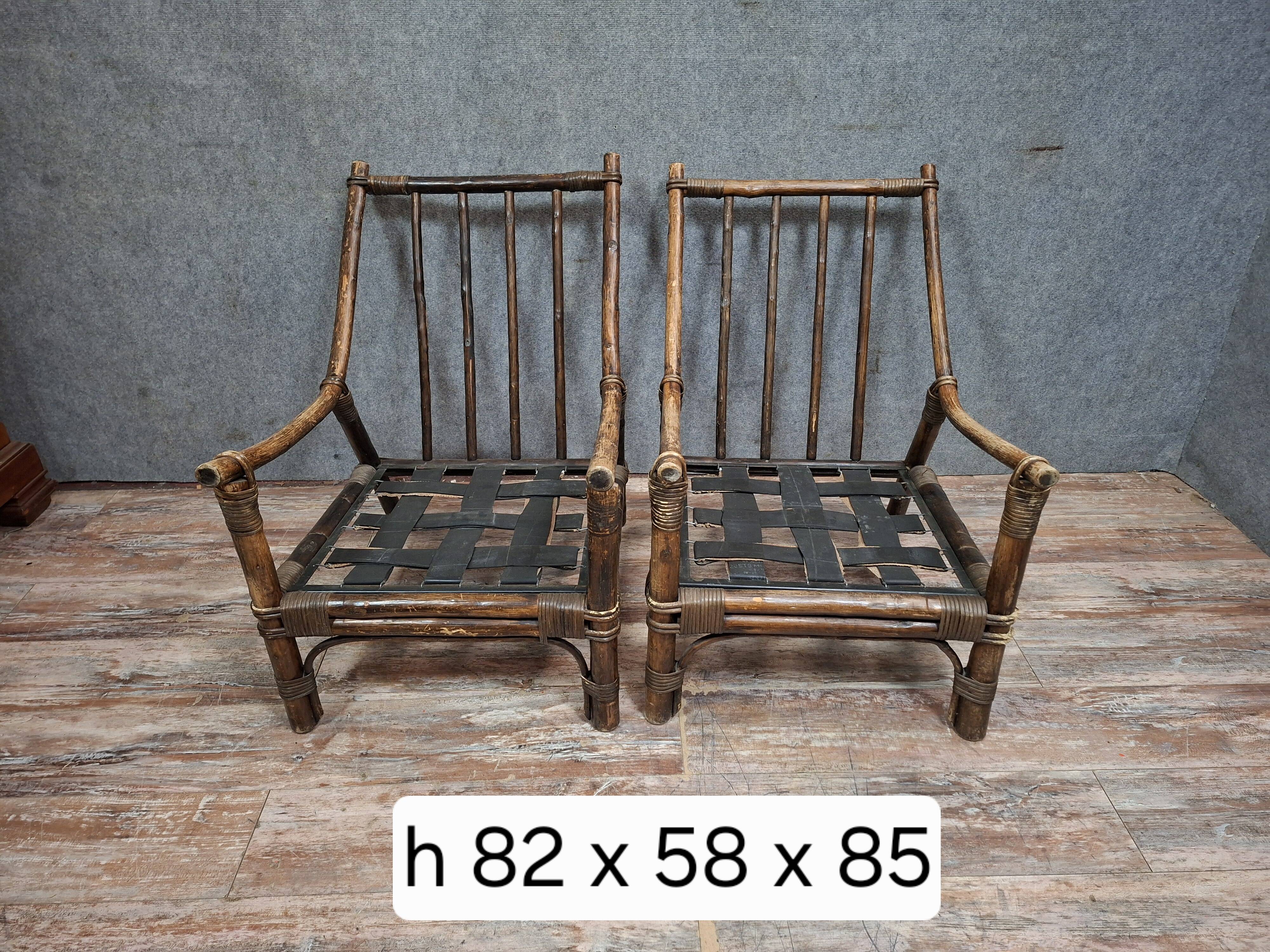 Pair of low bamboo armchairs with an exotic spirit, dating from the early 20th century.