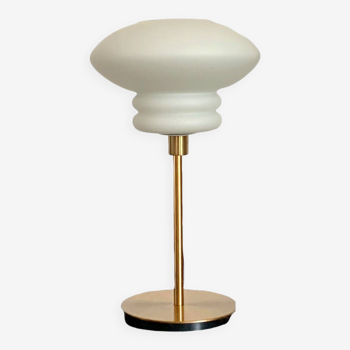 Table lamp made with an old white globe in matt opaline