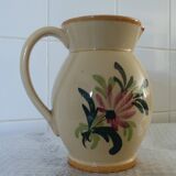 Old pitcher, pot to ance, faience, floral decoration.