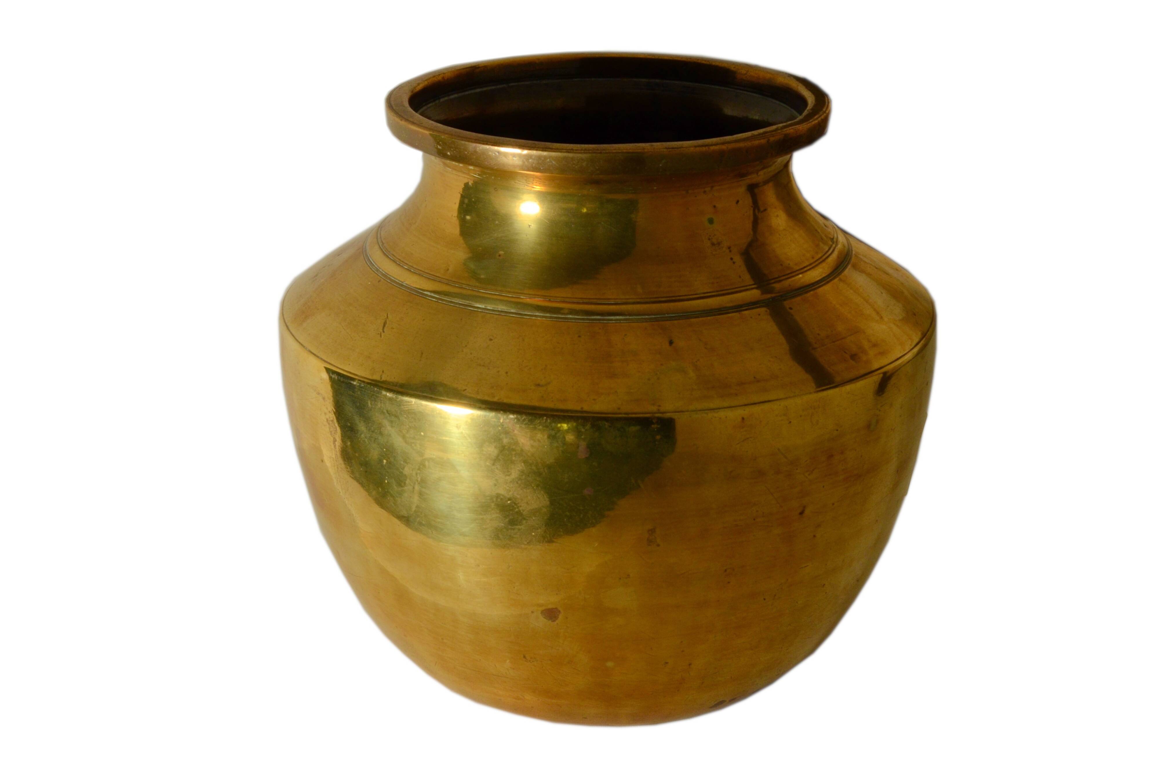 Ethnic vase in antique brass, handcrafted in India.