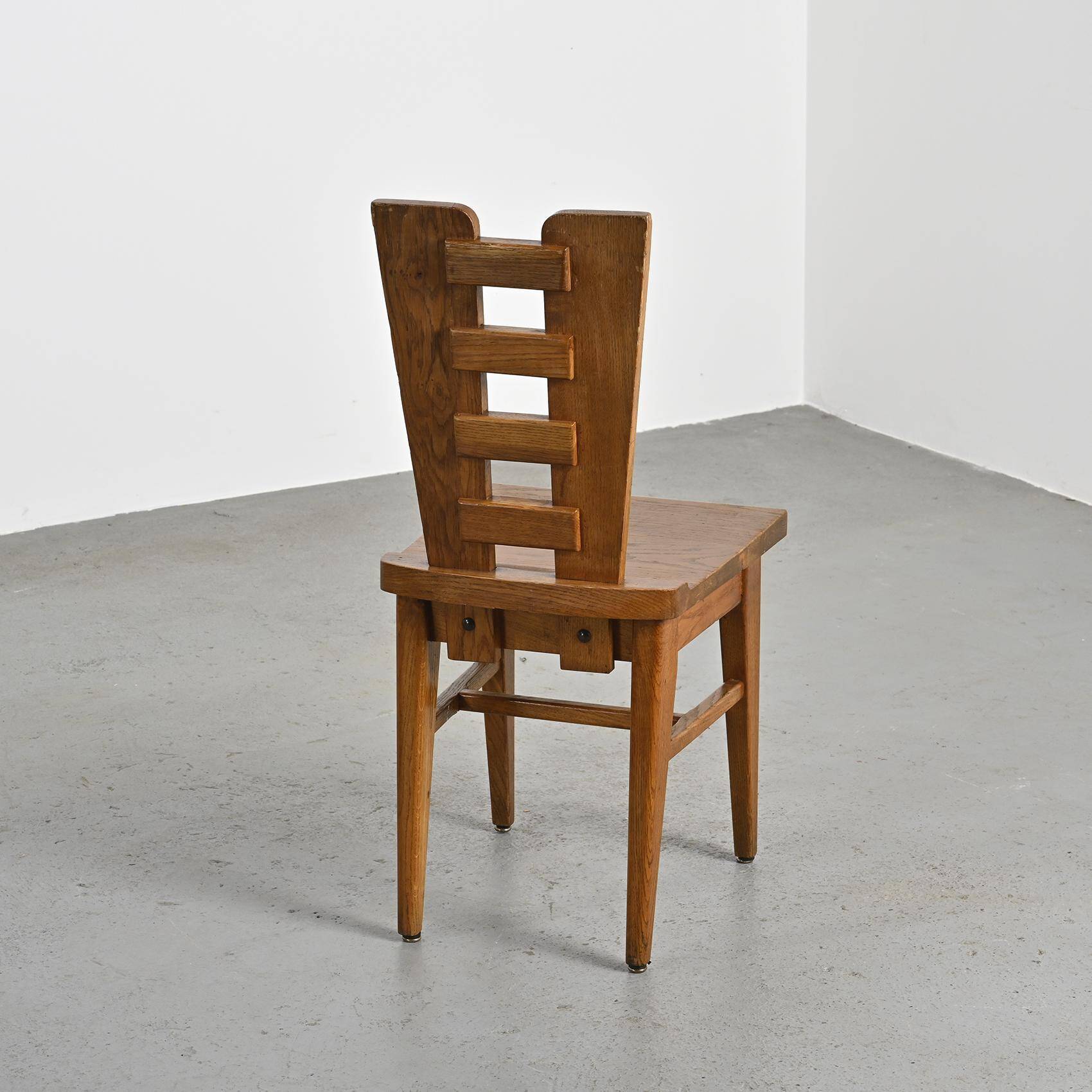 Set of six oak chairs by Henry Jacques Le Même, France circa 1940