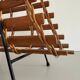 Mid-century black metal and wicker magazine rack, 1960, Germany