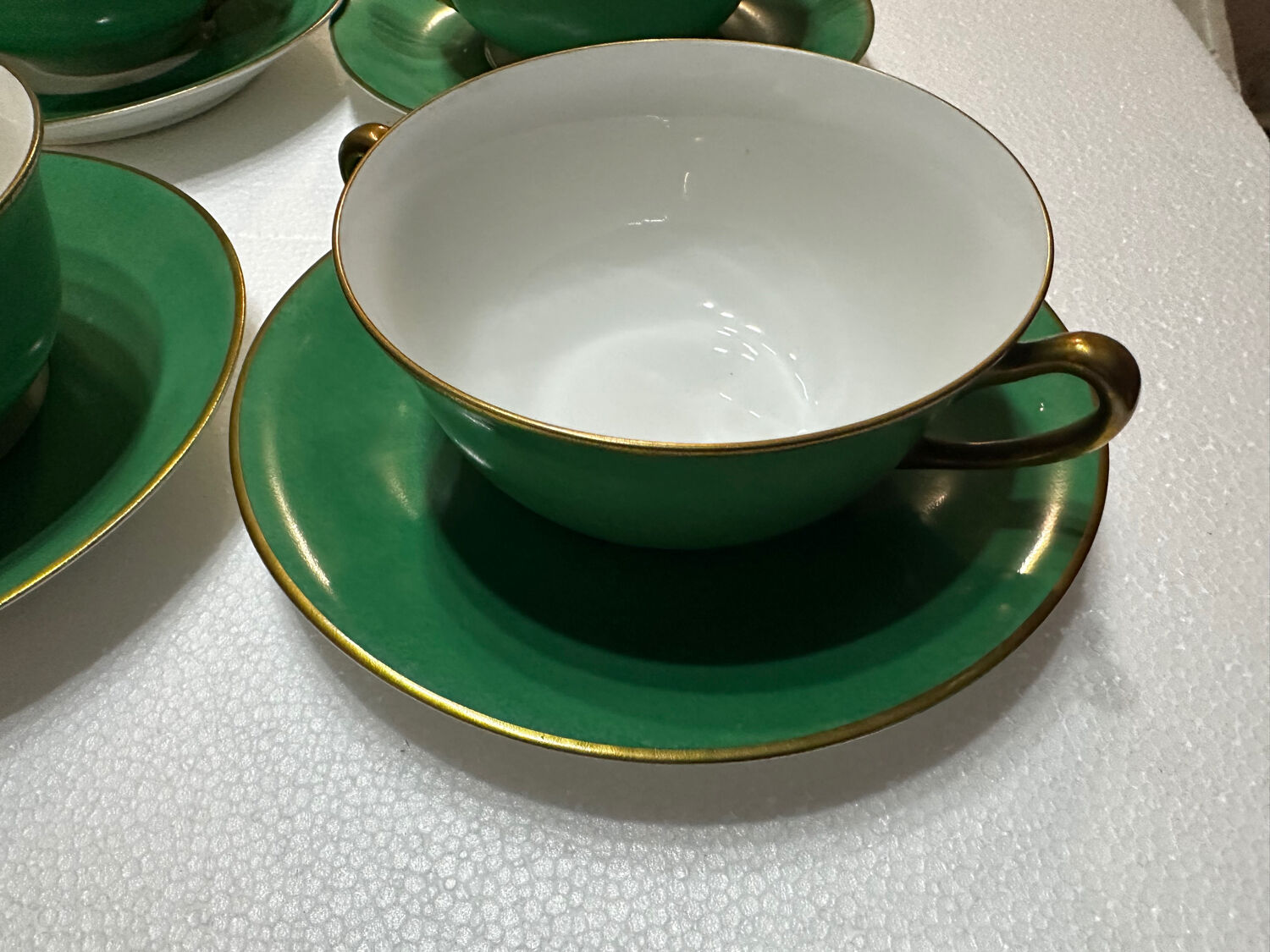 Service 14 cup and saucer in Art Deco Emerald Green and Gold.