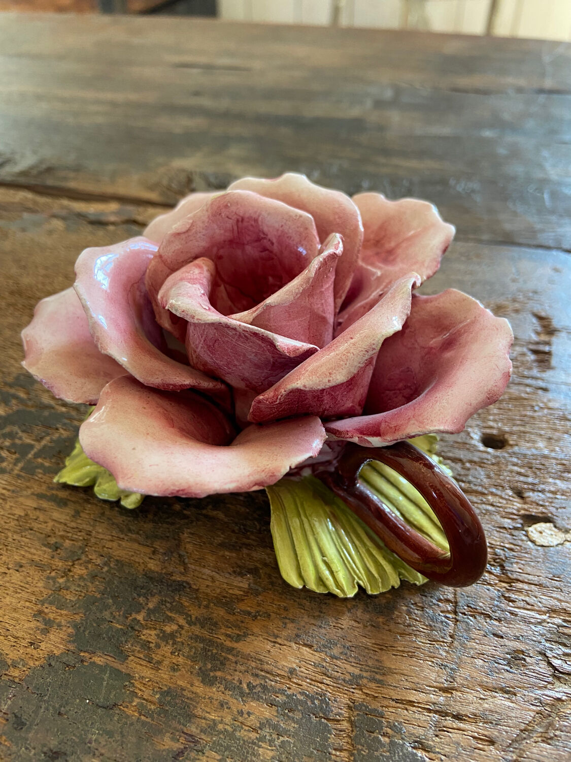 Rose-shaped earthenware candle holder