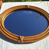 Natural rattan oval mirror bound