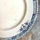Longchamp flat plate in iron earth, “Lily” service