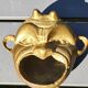 Ashtray/empty pocket devil's satyric head/diablotin, in bronze with golden patina. signed medina iran