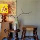 Low vintage regional stool in solid wood with straw top