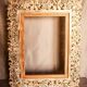 Carved wooden frame. carved wooden frame with floral motifs.