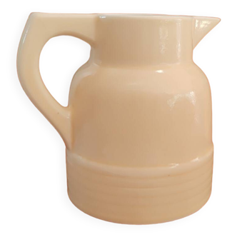 Pale yellow glazed ceramic pitcher from the 50s