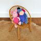 Children's shell armchair in rattan 1960s