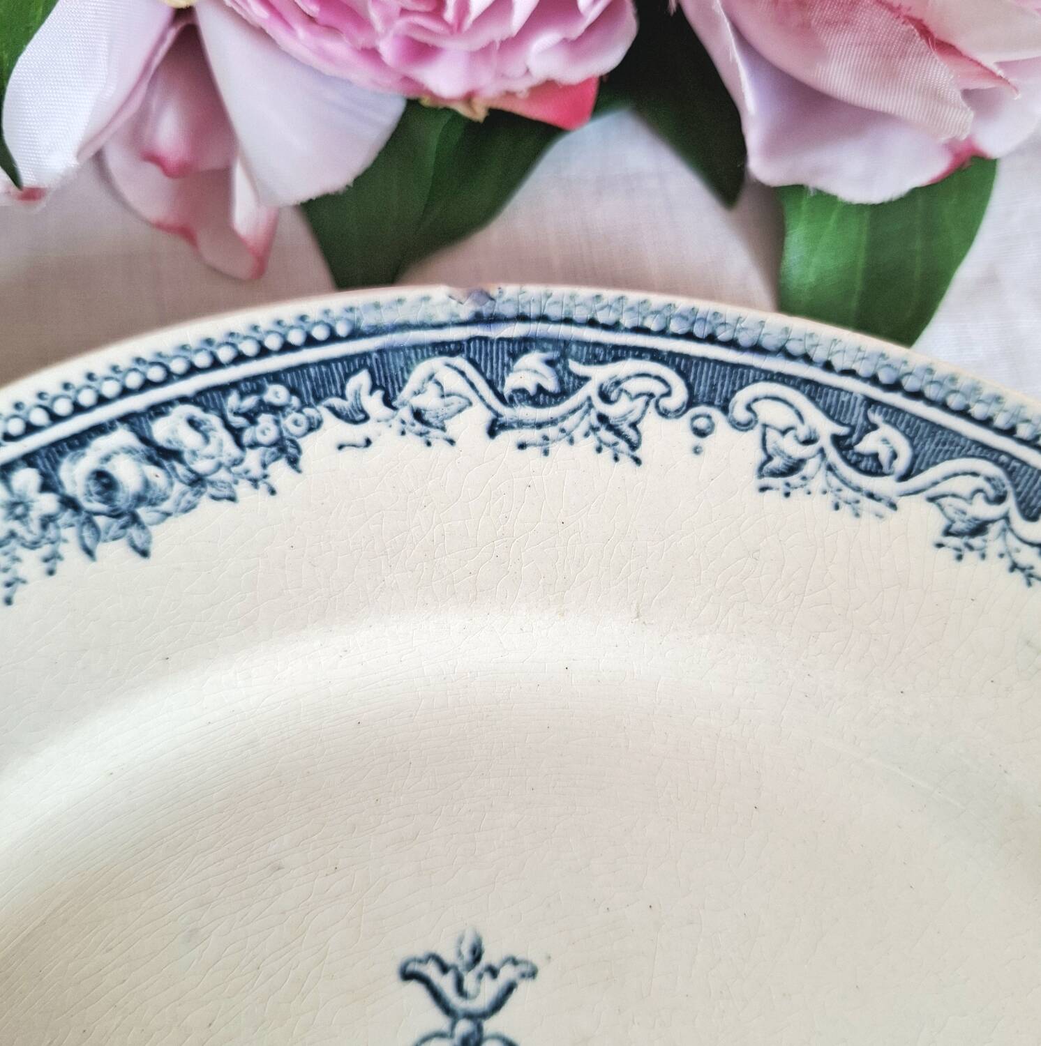 Antique earthenware dessert plates accompanied by a dish