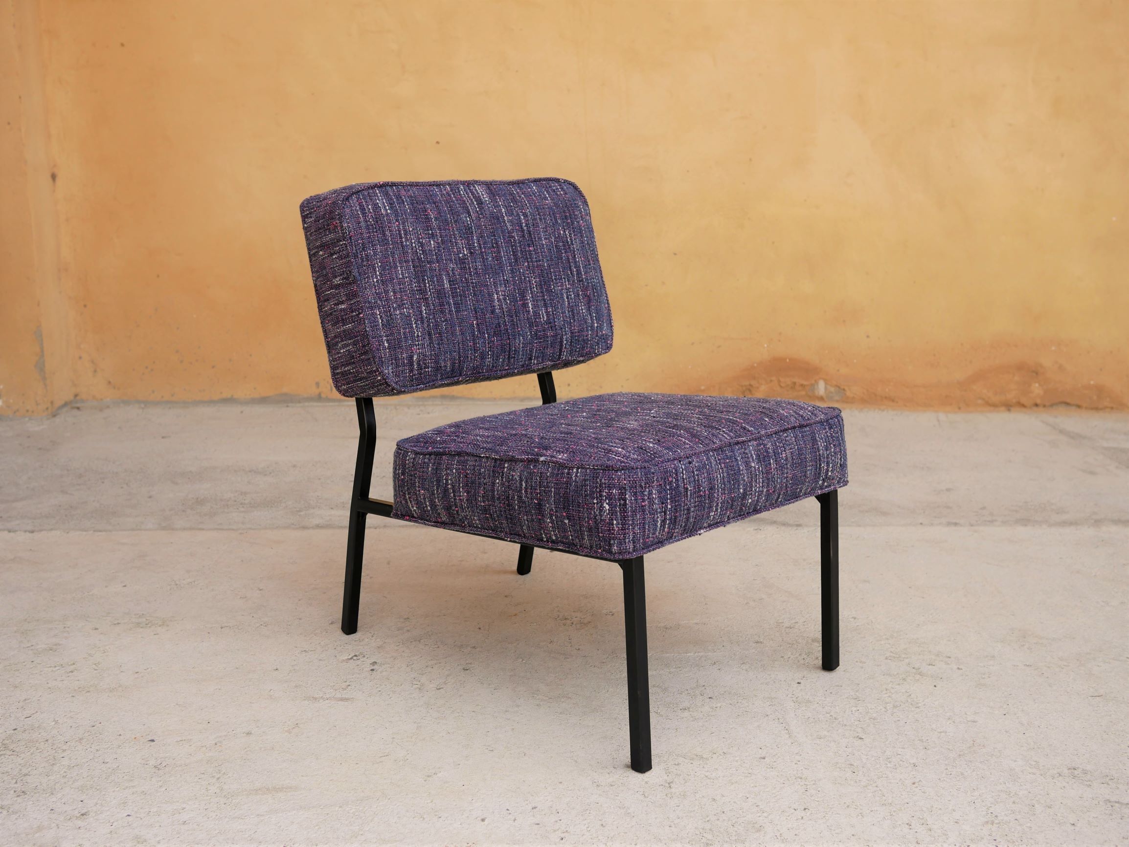 Vintage modernist metal foot armchair