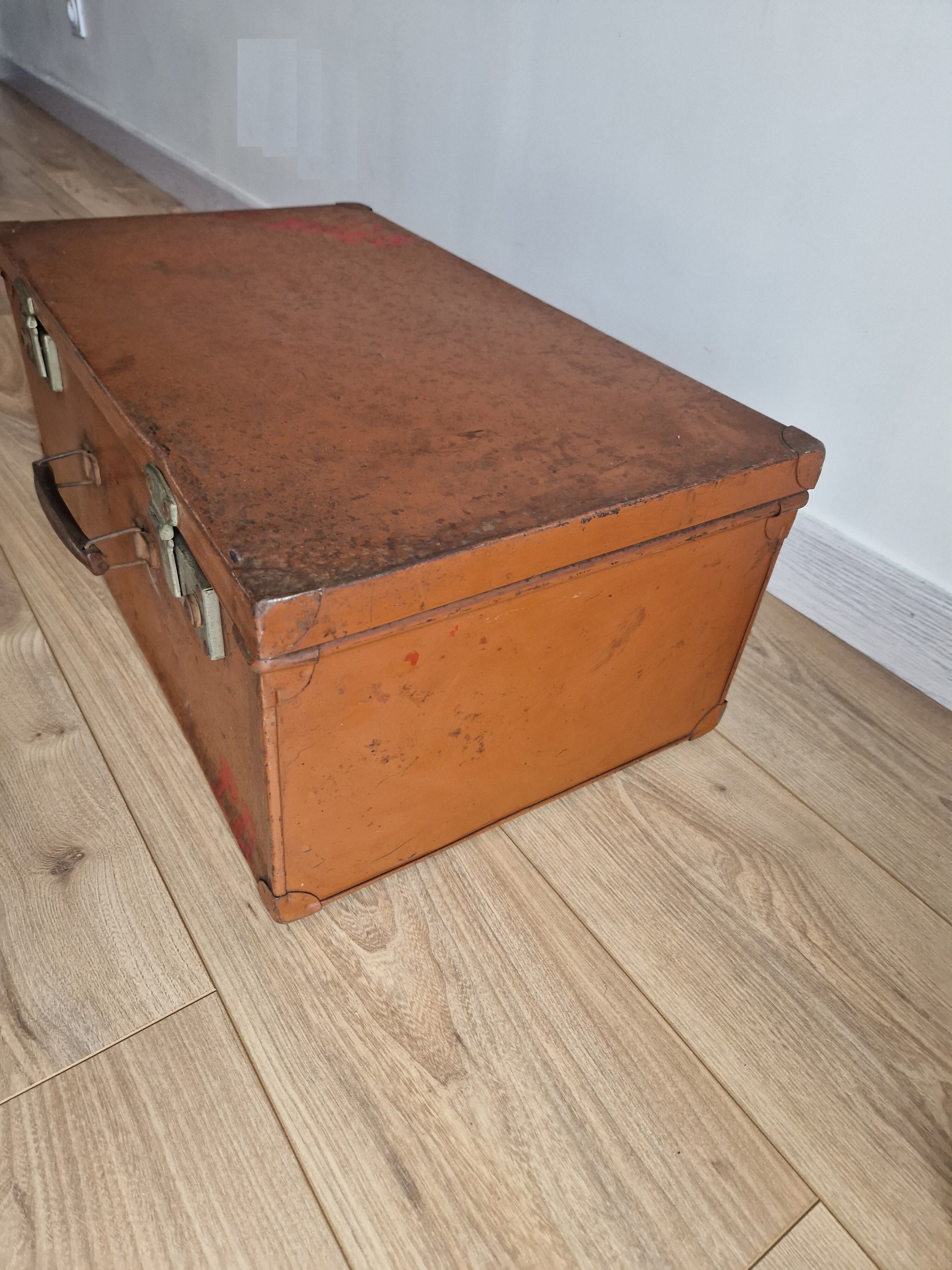 Old vintage military trunk orange metal