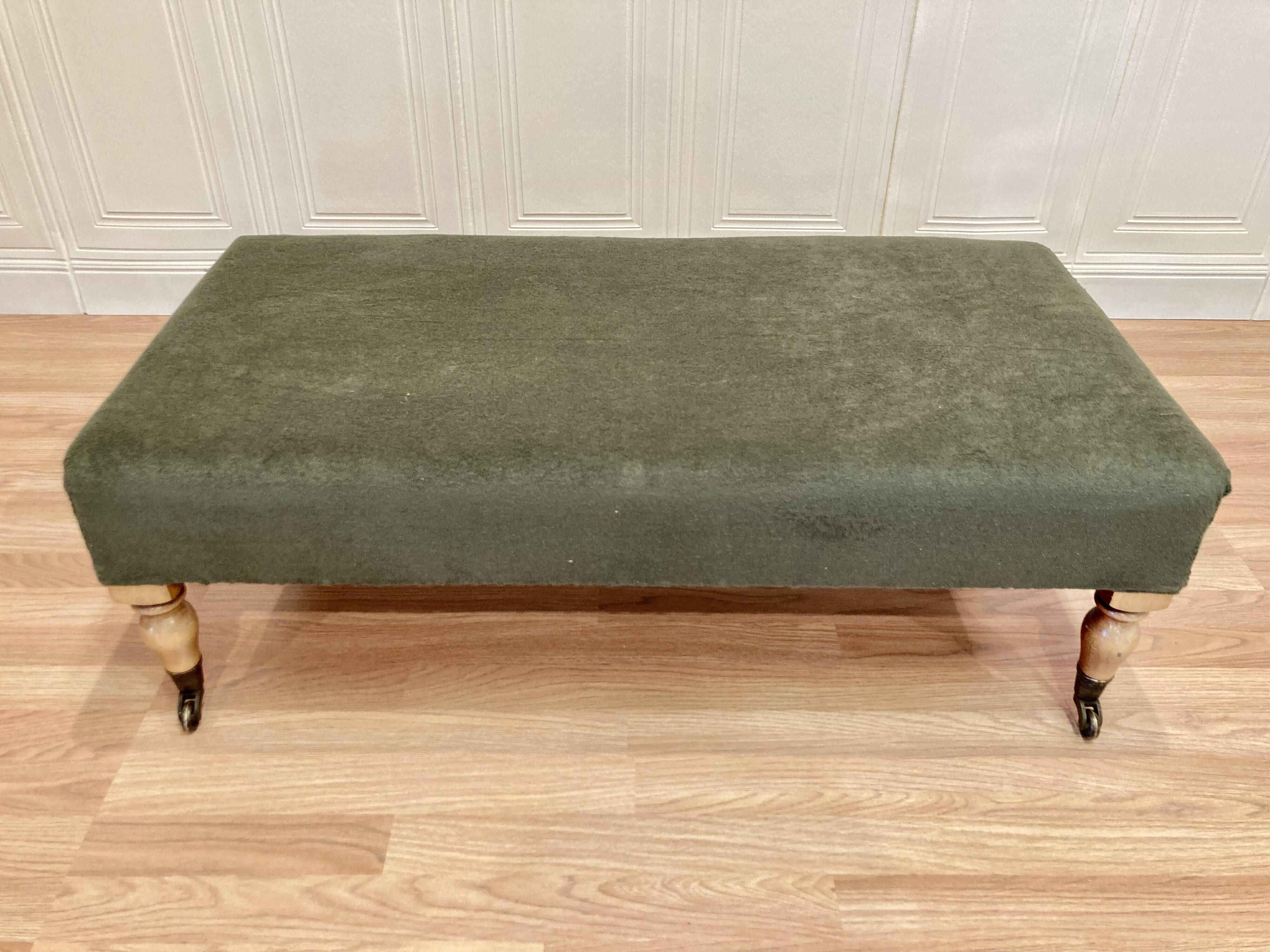 Khaki and oak sofa on casters, 1950s design.
