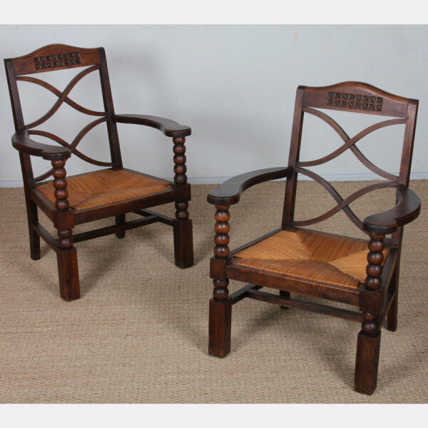 Pair of armchairs in the style of Charles Dudouyt, 1950.