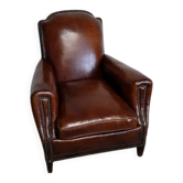 Fauteuil club clouté