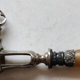 Manche pince a gigot corne et métal argenté