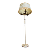 Vintage brass onyx floor lamp with fringed shade.