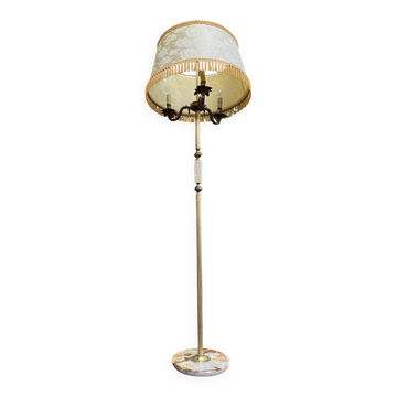 Vintage brass onyx floor lamp with fringed shade.