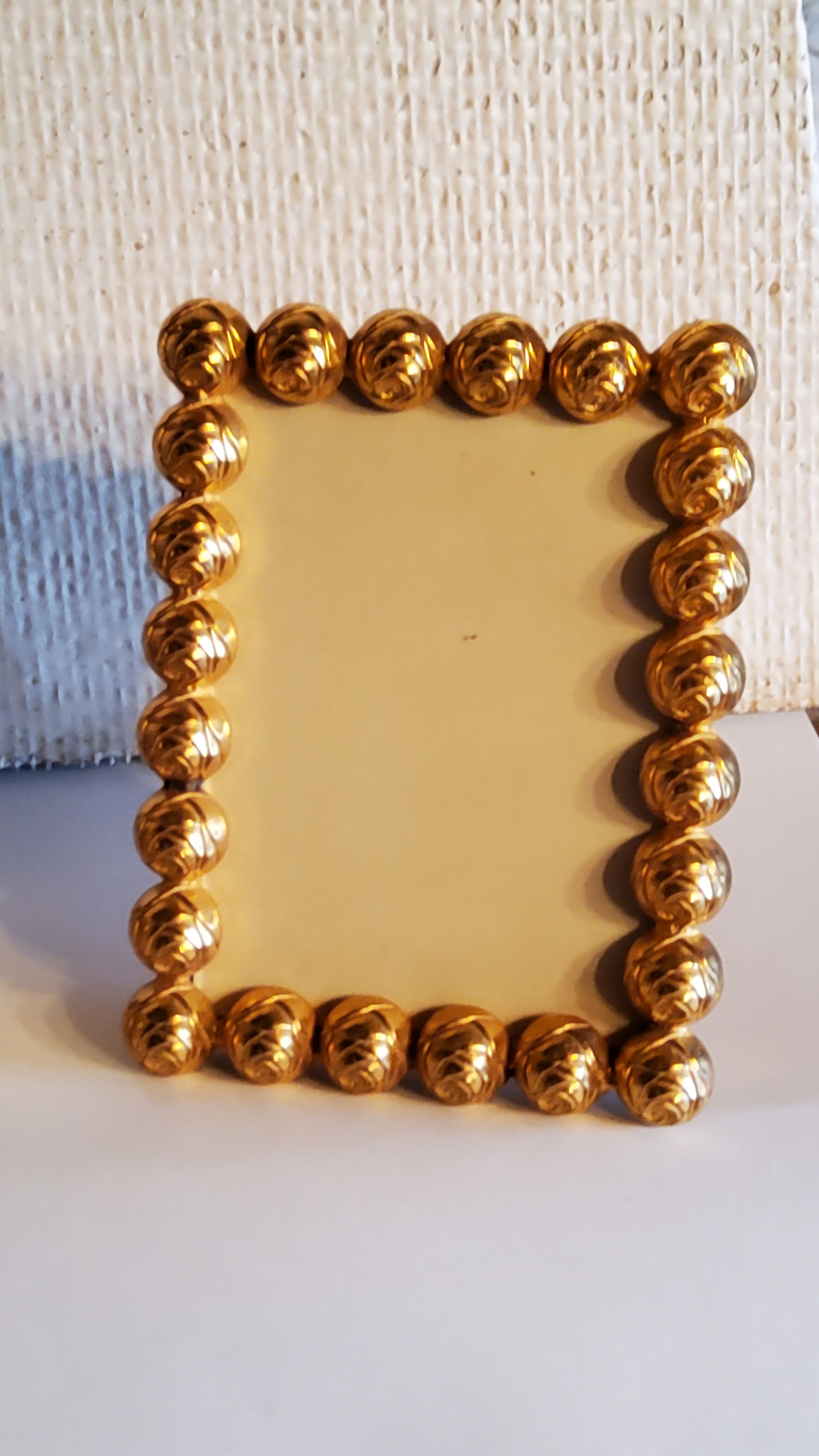 Pair of art deco photo frames in gilded bronze and gilded brass