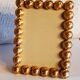 Pair of art deco photo frames in gilded bronze and gilded brass