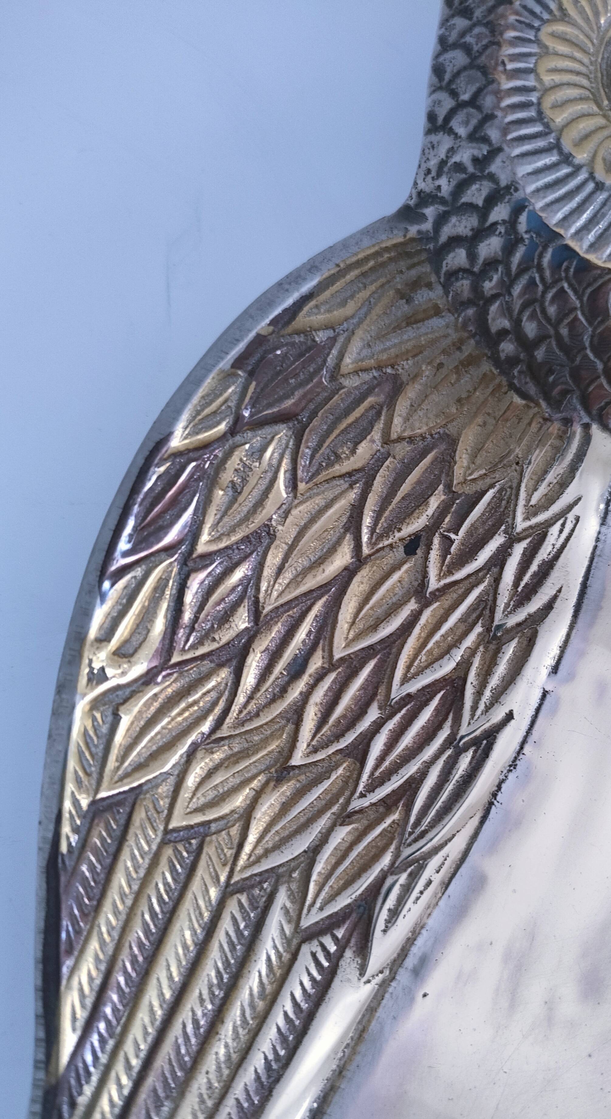 Empty pocket owl in gold and silver metal