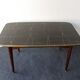 Folding table with black and gold painted glass, 1950
