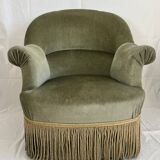 sage green toad armchairs with gold fringe