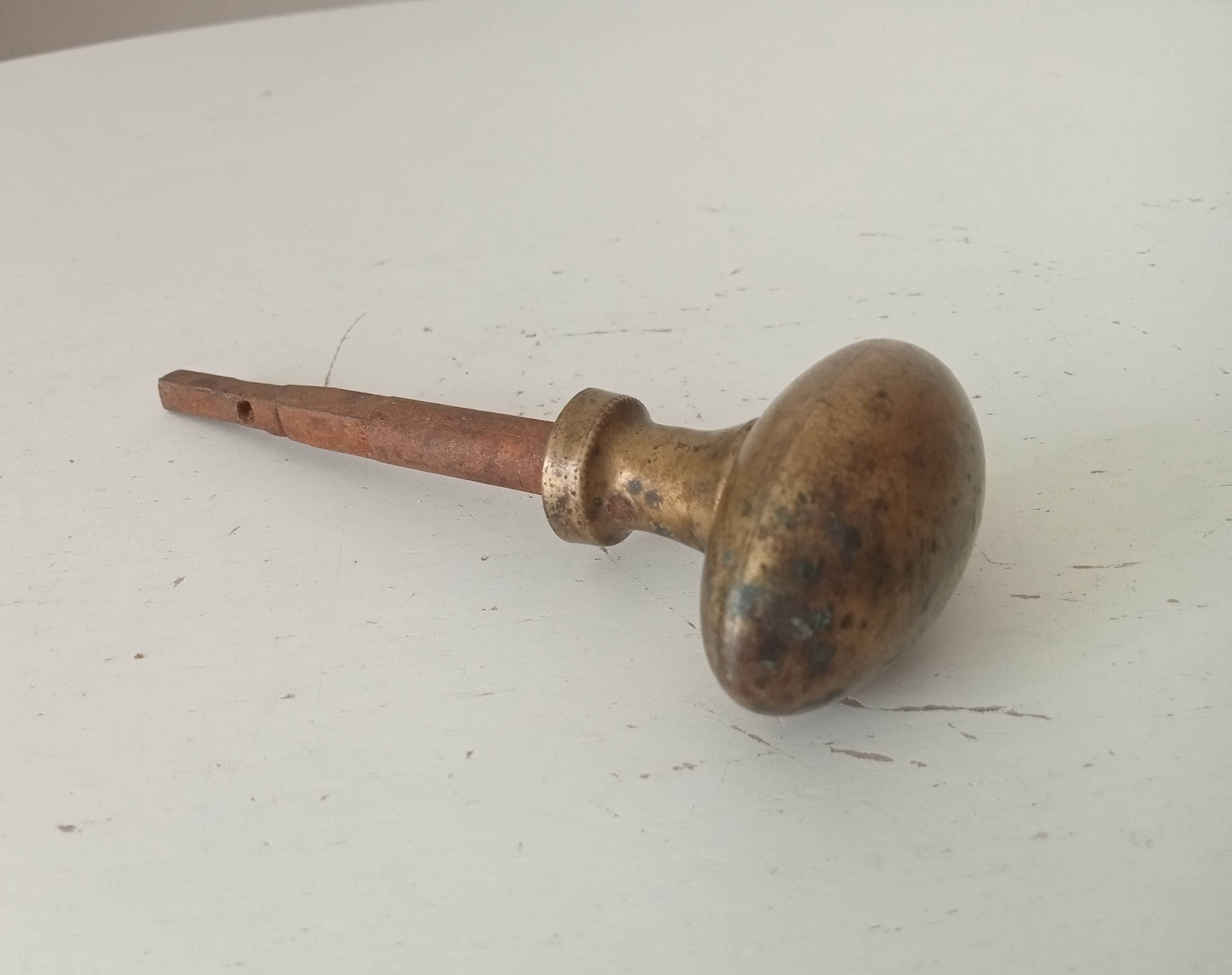 Antique olive door handle from the 19th century.