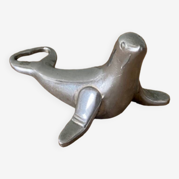 Vintage bottle opener in the shape of a sea lion