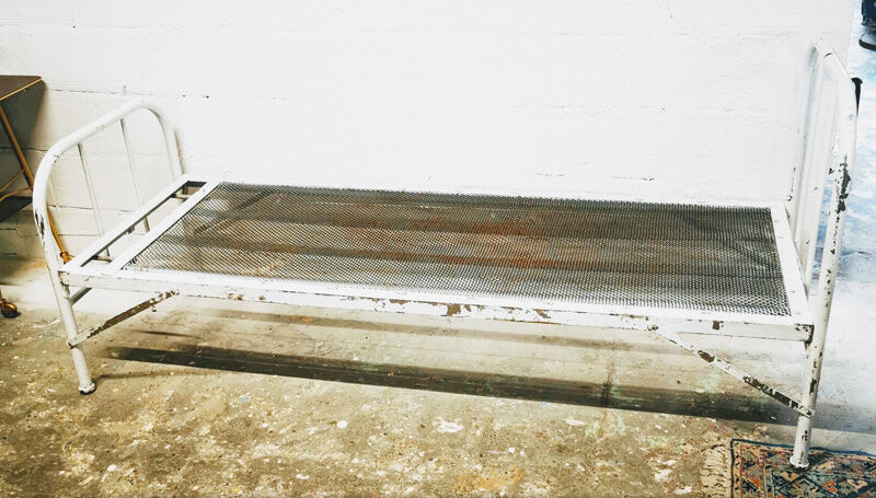 Folding iron boarding school bed