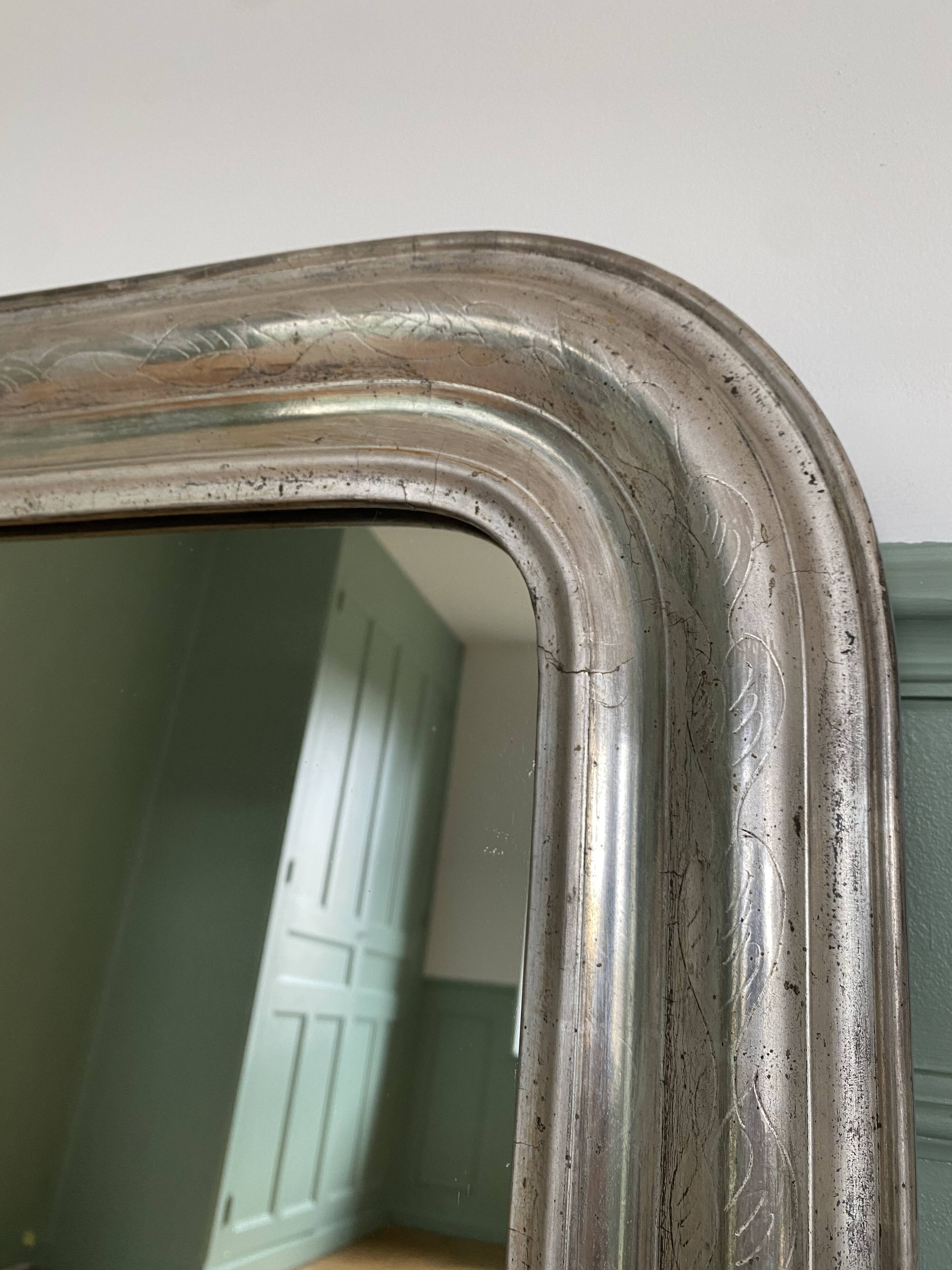 Louis-Philippe mirror gilded with silver leaf