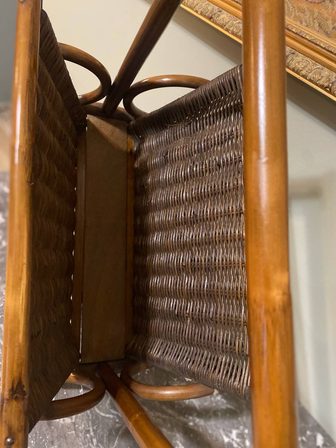 Wicker and brown wood magazine rack