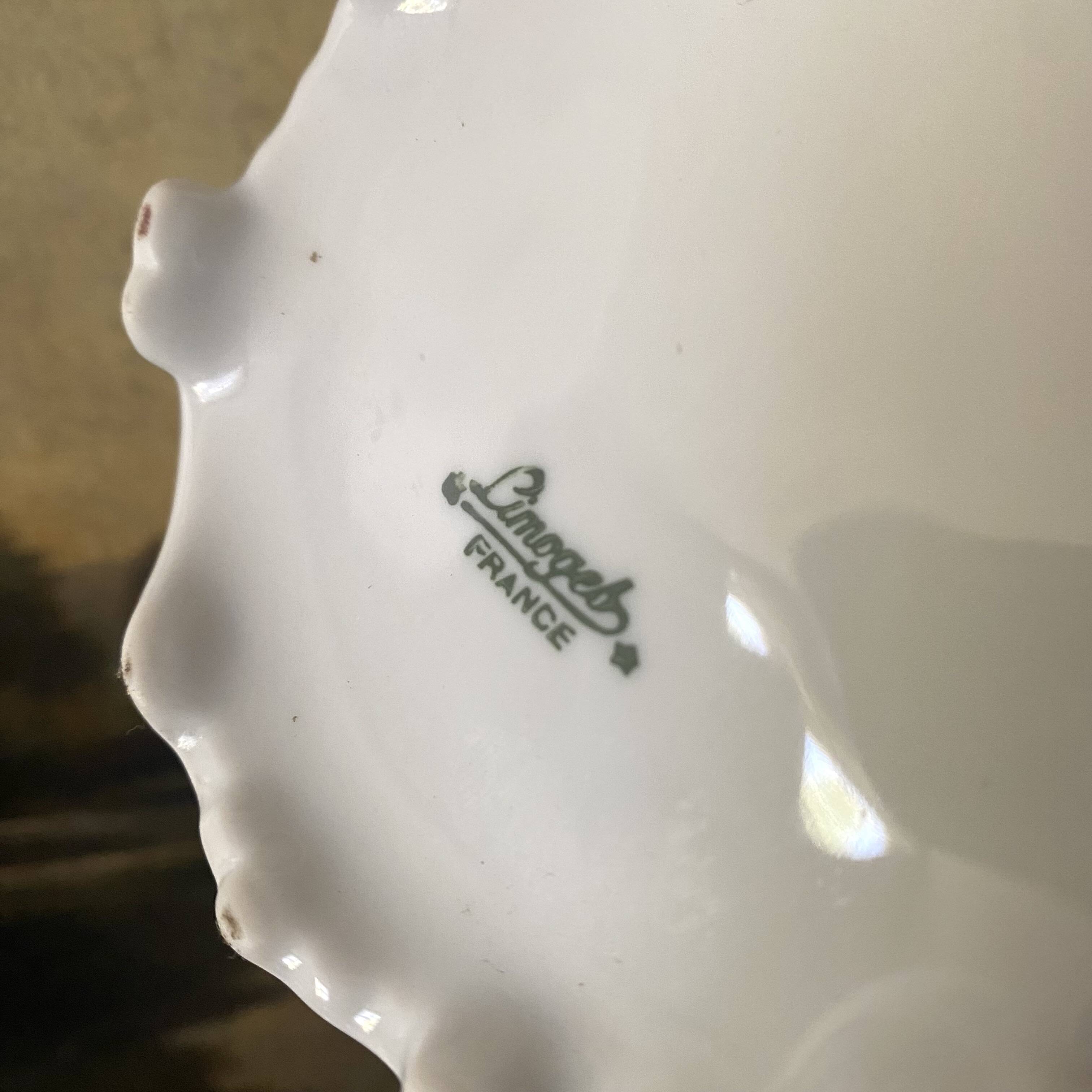 Pair of Limoges porcelain candlesticks